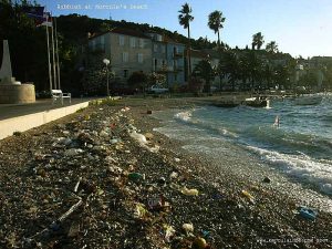 Plastic bottles and plastic bags on Spomemik Beach , Korcula